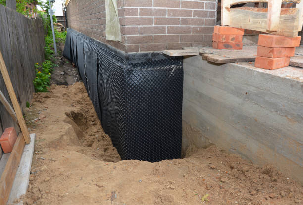 SJ Waterproofing Pros technician performing targeted Vapor Barrier Installation assessment in Bath, PA